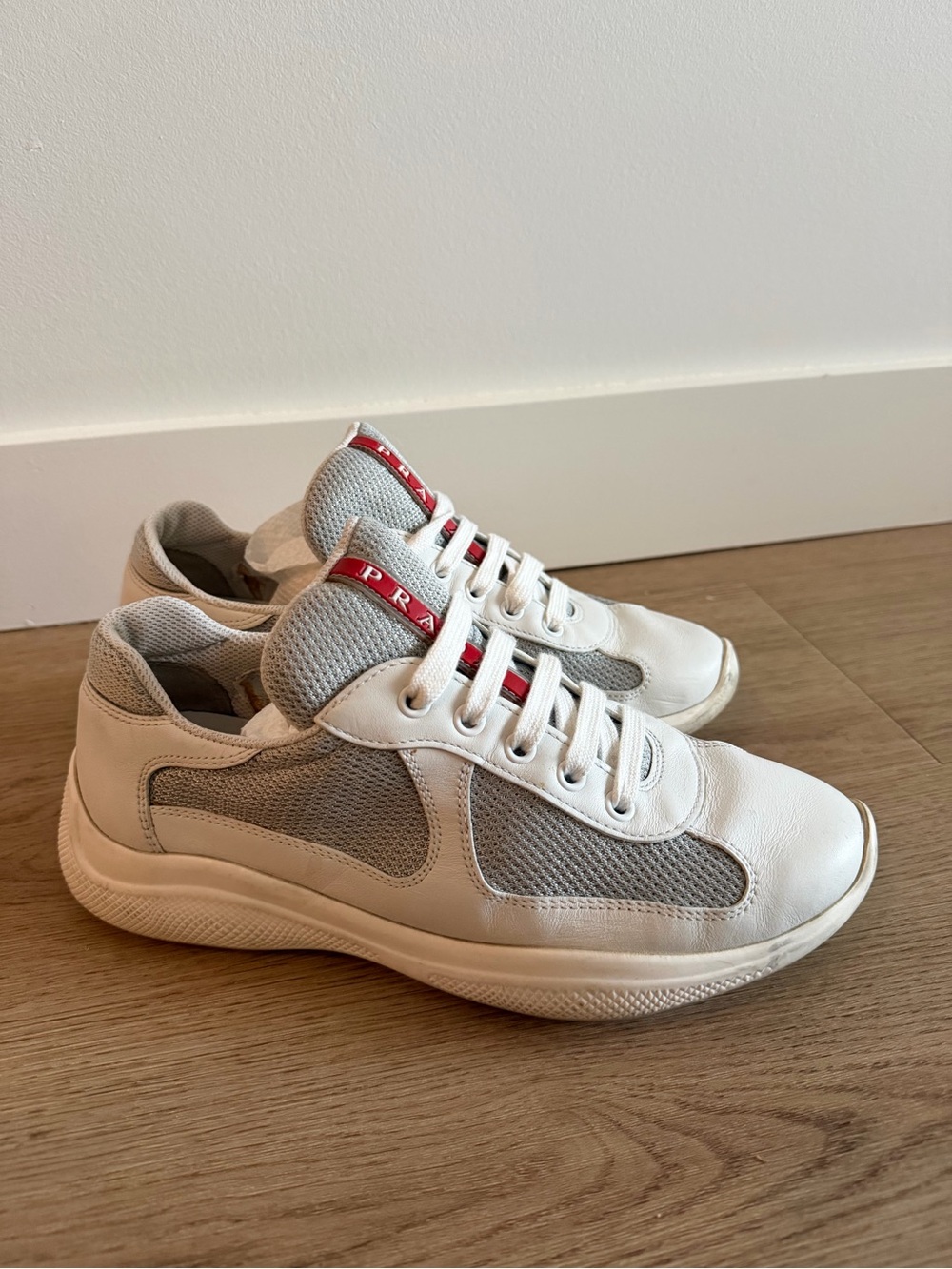 Prada White and Light Gray Mesh Low-Top Sneakers with Red Logo Trim